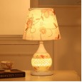 Chinese ceramic bedroom bedside table lamp creative hollow warm and romantic wedding wedding room modern and simple