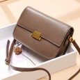 Spring and summer new women's bag tide Hong Kong style retro simple first layer leather crossbody bag lock tofu bag small square bag