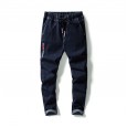 Spring wear new jeans casual Korean small feet elastic tether trendy men's slim long pants