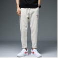 Spring and autumn new four seasons slim jeans fashion Korean version of the wild elastic feet pants blue trend men