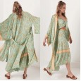 Spring and summer new bohemian beach holiday style printed sunscreen cardigan shawl outside