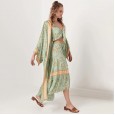 Spring and summer new bohemian beach holiday style printed sunscreen cardigan shawl outside