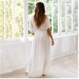 Spring and summer new sexy temperament holiday style deep V-neck solid color loose lace dress beach long skirt
