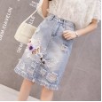 Broken denim mid-length skirt female spring new beaded embroidery tassel high waist a word was thin package hip skirt