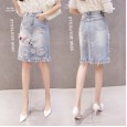 Broken denim mid-length skirt female spring new beaded embroidery tassel high waist a word was thin package hip skirt